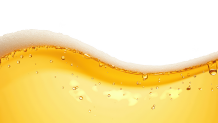 Golden liquid with frothy bubbles creates refreshing wave, perfect for beverage imagery