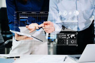 Business team hand Project manager working and update tasks and Gantt chart scheduling virtual diagram.