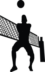 Silhouette of a Volleyball Player Serving a Ball Over the Net
