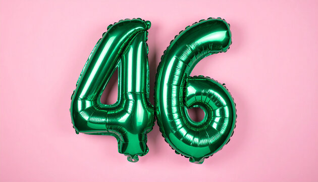Floating shiny green foil balloon number 46 in pink backdrop, soft glowing light. - Powered by Adobe