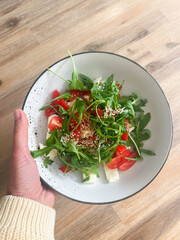 fresh salad on a wooden table