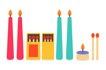 Colorful burning taper candles, a tealight, and open matchboxes with wooden matches