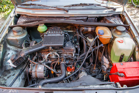 Novozybkow, Russian Federation - August 23, 2016: Volkswagen Jetta II engine compartment showcasing intricate mechanical components and vibrant colors, highlighting automotive engineering and design