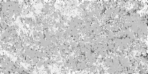 Abstract textured background with a speckled pattern in shades of gray and white