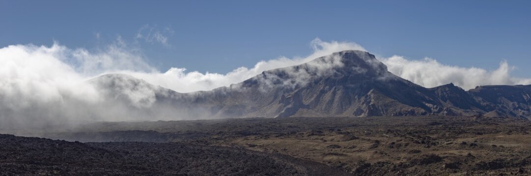 The summit of Monta&ntilde;a Guajara, also: Alto de Guajara, 2715m, crater walls, Caldera de las Ca&ntilde;adas, a huge volcanic cauldron, Teide National Park, Parque Nacional del Teide, at sunrise, Tenerife, Canary Islands, Spain