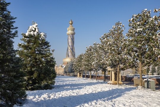 Winter park with Istiklol Tower, Independence and Freedom Tower, Dushanbe, Tajikistan, Central Asia