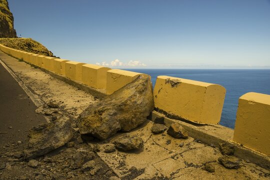 Rockfall, damaged concrete wall, road to Punta de Teno, Tenerife, Canary Islands, Spain