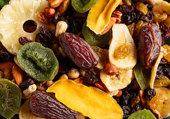 Dried tropical fruits with various nuts and raisins.