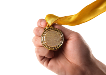 Hand Holding Gold Medal with Yellow Ribbon in Close Up on White Background