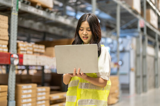 Female engineers discussing inventory in warehouse logistics and supply chain planning, operation management, data analysis, warehouse shipping, inventory tracking, optimization and technology