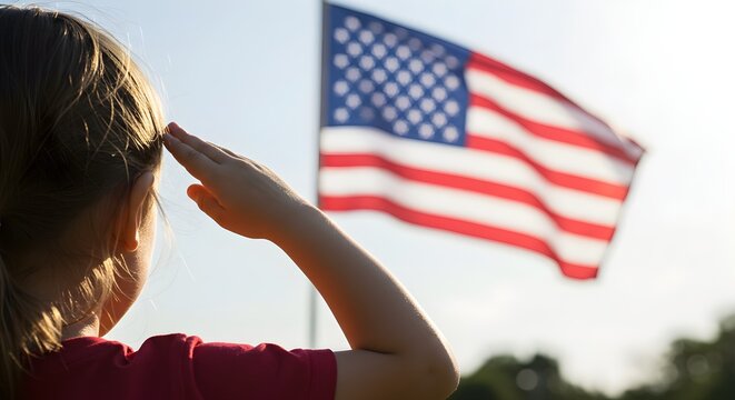 Child saluting american flag - Patriotism and national pride concept