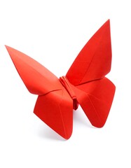 Bright red folded paper butterfly displayed isolated on a white background