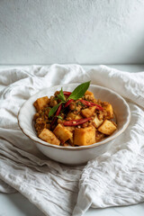 Hearty vegetable stir fry with fresh basil garnish