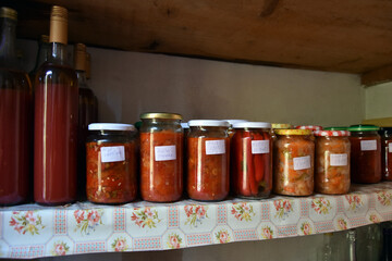 Winter preserves on a pantry shelf