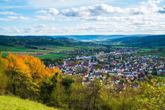 Germany, Rudersberg city panorama view above houses, roofs, green nature landscape on sunny day in rems murr kreis region in autumn