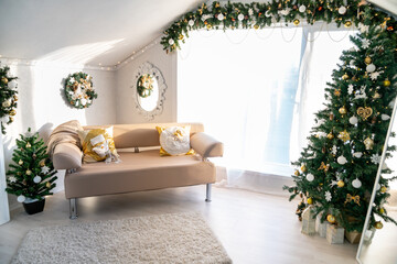 Christmas interior of a bright living room. The attic. Daytime