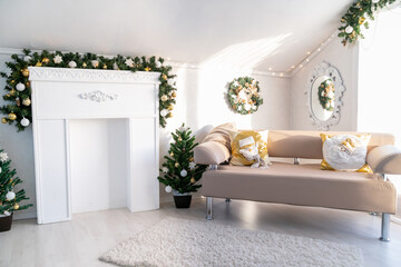 Christmas interior of a bright living room. The attic. Daytime
