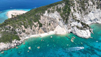 Aerial drone photo of scenic caves and beach in paradise island of Marathonisi in bay of Laganas,...