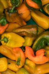 Fresh vegetables at small local urban market. Organic produce on sale at outdoor farmer market. Selling fresh crops and veggies harvest. European urban setting. Close up. Part of the series