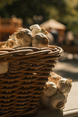 Fresh vegetables at small local urban market. Organic produce on sale at outdoor farmer market. Selling fresh crops and veggies harvest. European urban setting. Close up. Part of the series