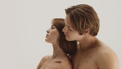 Tender moment of couple leaning together with serene mindfulness. Concept of wellness calm,...