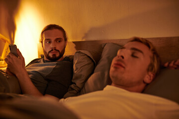 Fototapeta premium After a romantic date, a gay couple reflects on their evening in a cozy bedroom space