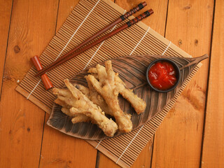 Fried chicken feet on white background
