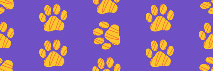 Vector seamless pattern with orange pet paw prints on a purple background. Simple hand-drawn doodle style for kids, fabric, and pet branding