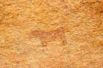 Ancient rock paintings on stones at Spitzkoppe Community Campsite in Namibia