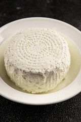 Cottage cheese fermented milk product portion size natural product tasty snack fresh delicious gourmet food background on the table rustic top view copy space keto and paleo diet