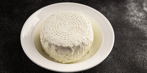 Cottage cheese fermented milk product portion size natural product tasty snack fresh delicious gourmet food background on the table rustic top view copy space keto and paleo diet