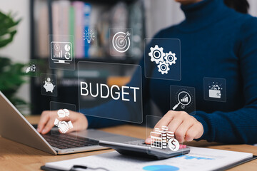 Budget concept. A person planning budget strategy using calculator and laptop with financial analytics icons for financial management, investment, annual expenses, personal budget, economic analysis,