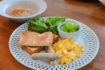 Western breakfast with scrambled eggs and toast

