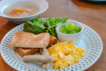 Western breakfast with scrambled eggs and toast
