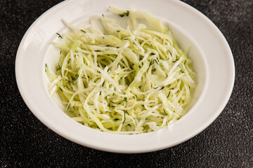 Cabbage salad coleslaw vegetables dish natural product tasty snack fresh delicious gourmet food background on table rustic top view copy space keto and paleo diet vegan and vegan food