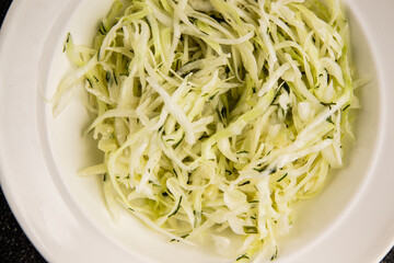 Cabbage salad coleslaw vegetables dish natural product tasty snack fresh delicious gourmet food background on table rustic top view copy space keto and paleo diet vegan and vegan food
