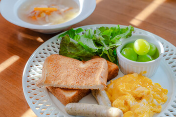 Western breakfast with scrambled eggs and toast
