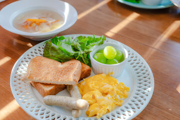Western breakfast with scrambled eggs and toast
