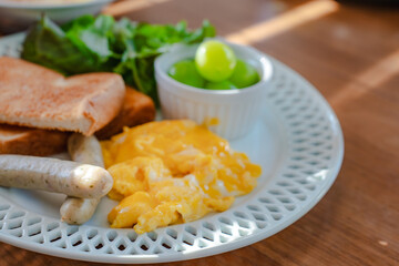 Western breakfast with scrambled eggs and toast
