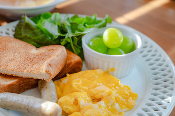 Western breakfast with scrambled eggs and toast
