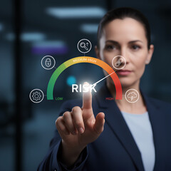 Businesswoman points to a digital risk meter, illustrating data security, threat assessment, and cyber protection in a modern corporate environment