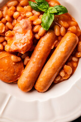 Cassoulet beans with meat and sausage french cuisine vegetables dish natural product tasty snack fresh delicious gourmet food background on the table rustic top view copy space