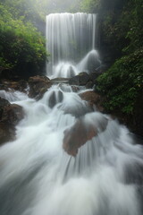 Fototapeta premium Pha Takien Waterfall , Accessible by a 2.5 km long trail from Pang Sida Waterfall. it is in one of the streams that feeds Pang Sida Waterfall. Pang Sida National Park ,, THAILAND