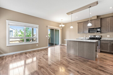 Large open kitchen with a counter and a sink
