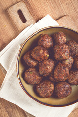 fried meatballs in a frying pan, homemade, no people,