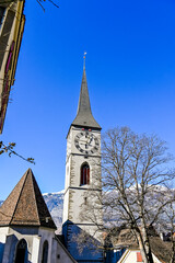 Chur, St. Martinskirche, Kirchturm, Turm, St. Martinsplatz, Altstadt, historische Häuser, Gassen, Alpen, Bergstrassen, Alpenstadt, Graubünden, Winter, Schweiz
