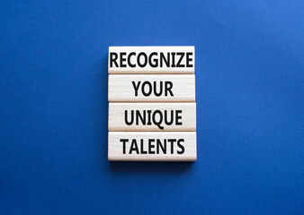 Unique Talents symbol. Concept words Recognize Your Unique Talents on wooden blocks. Beautiful deep blue background. Business concept. Copy space