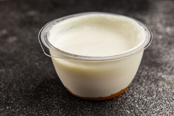 Yogurt or skyr natural dairy lactose free natural product tasty snack fresh delicious gourmet food background on the table rustic top view copy space