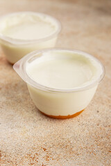 Yogurt or skyr natural dairy lactose free natural product tasty snack fresh delicious gourmet food background on the table rustic top view copy space