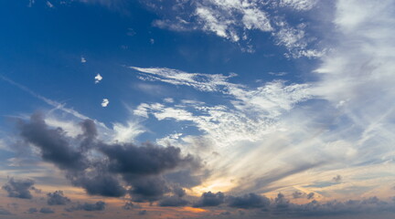 Blue Sky Overlay with White Clouds and Golden Sunset Light - Professional Weather Texture for Video Production. High-Quality Sky Effect with Bright Cloud Formations and Warm Atmospheric Light for Cine